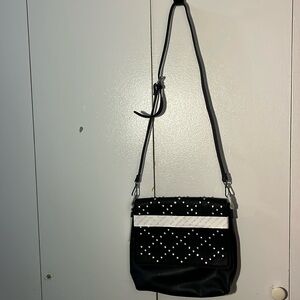 MAGNOLIA AND VINE VERSA COLLECTION Black Leather Clutch with Silver Accents